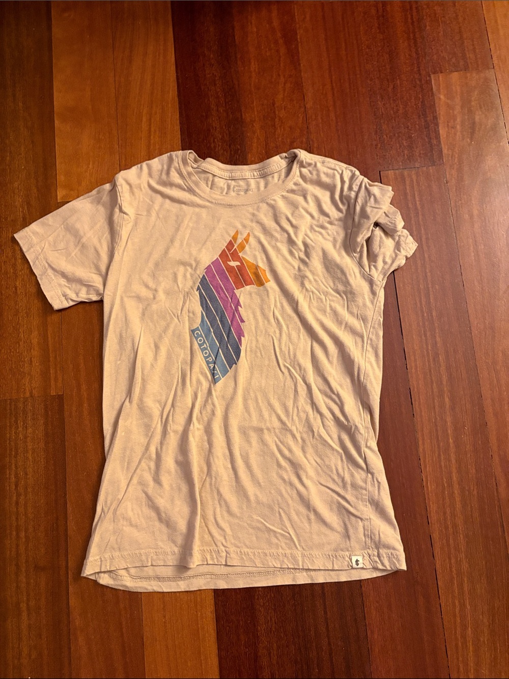 cotopaxi Cream' Tee with Multicolor Striped Unicorn Graphic